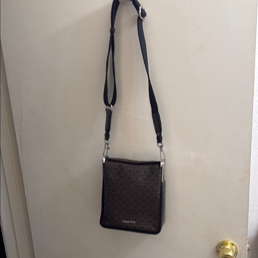 Calvin Klein Brown Messenger Bag with Adjustable Strap and Structured Shape